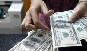عقب نشینی دلار به پایین ترین سطح پنج ماه اخیر