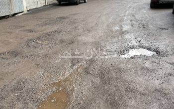عکس و فیلم/وضعیت عجیب آسفالت یکی از کوچه های رشت فقط سه هفته بعد از پایان کار